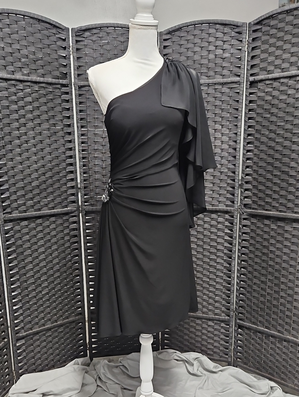 Size 4 black one shoulder w/ capelet style flare, ruched, sequin trimmed jersey